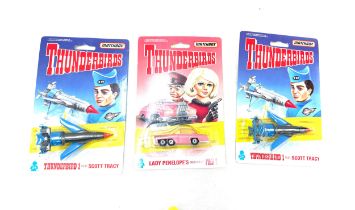 2 x Thunderbirds 1 pilot Scott Tracy in original packaging, Lady Penelope's car in original