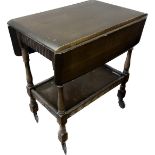 Oak drop leaf tea trolley made by Priory furniture with drawer measures approx 30 inches tall, 28