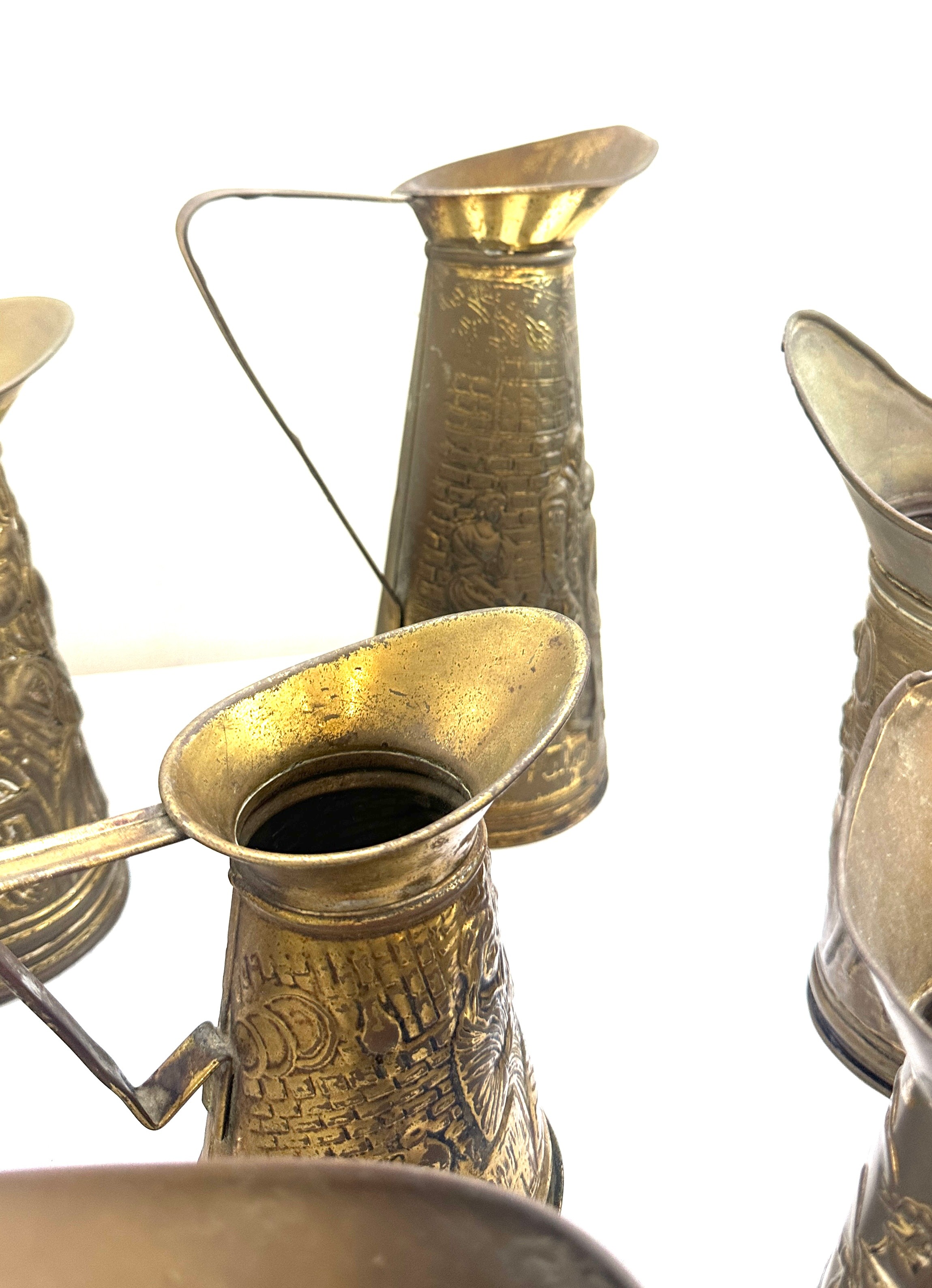 Selection embossed brass jugs, various heights - Image 3 of 6
