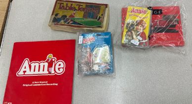 Vintage boxed table tennis game and a selection of Annie ephemera