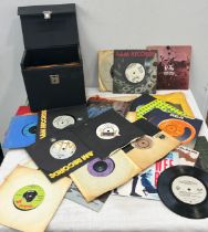 Selection of cased 45's to include artists David Bowie, Leo Sayer, Pink Floyd, Steve Wonder etc