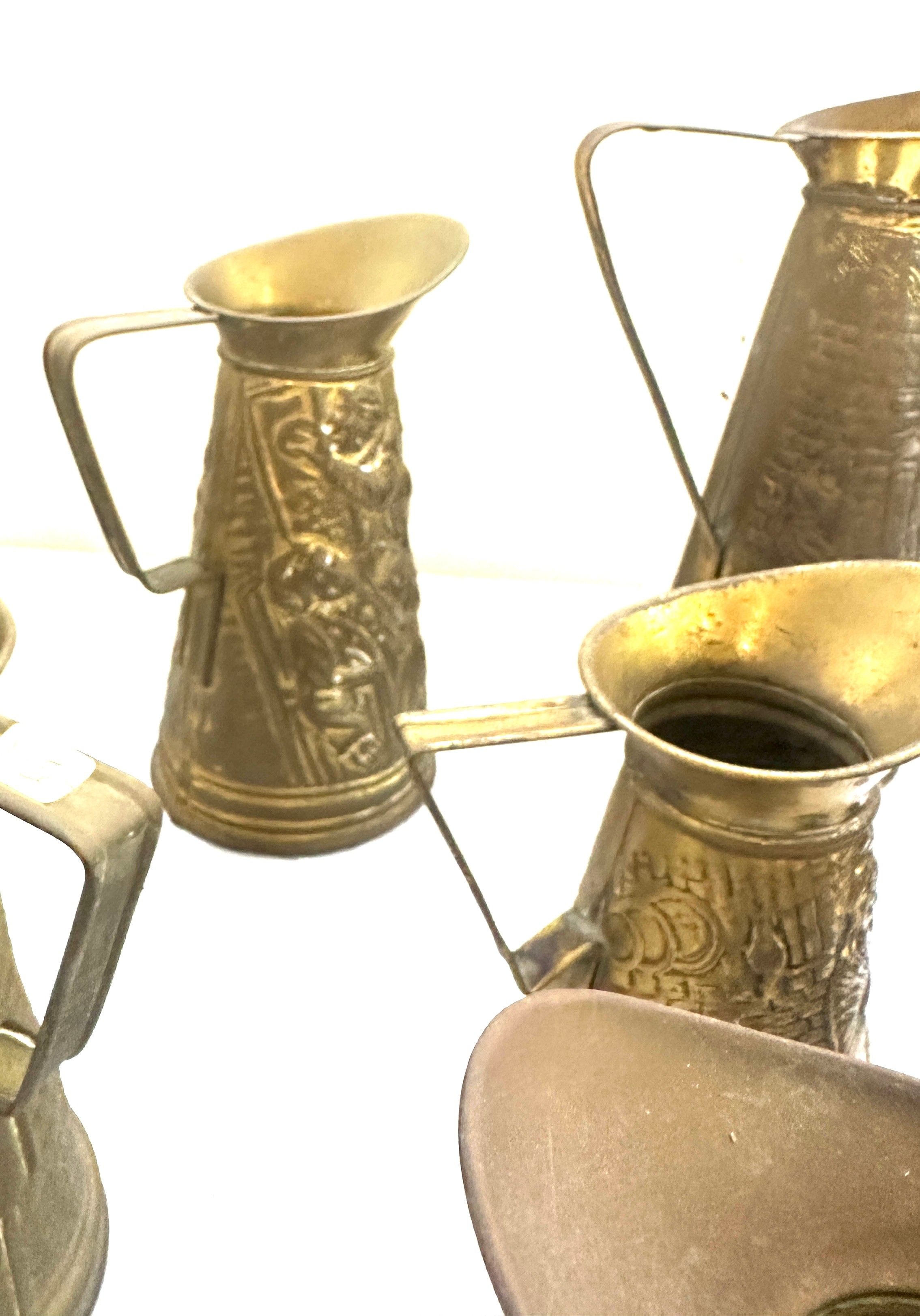 Selection embossed brass jugs, various heights - Image 2 of 6