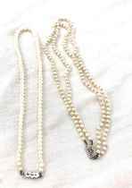 2 Pearl necklaces with white gold clasps