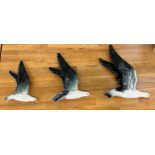 Three piece graduating hand painted gulls largest measures approx 14 inches wide