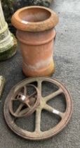 Terracotta chimney pot 11 inches tall and 2 industrial metal wheels