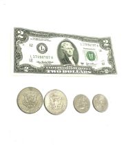 Selection of coins includes Kennedy 1/2 dollars, 1/4 dollar 2 dollars etc