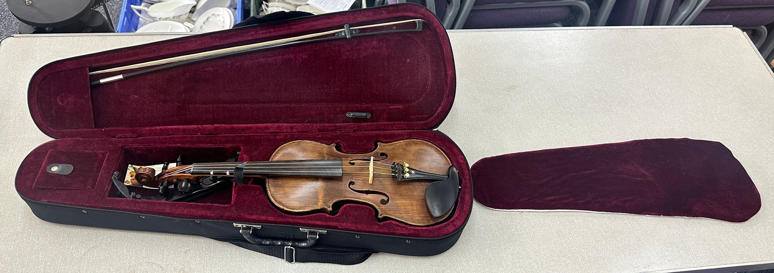 Cased violin