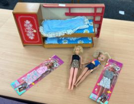 2 Vintage sindy dolls, a sindy bed and 2 boxed steffi love outfits