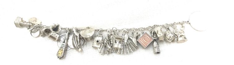 Vintage silver charm bracelet, approximate weight 76g