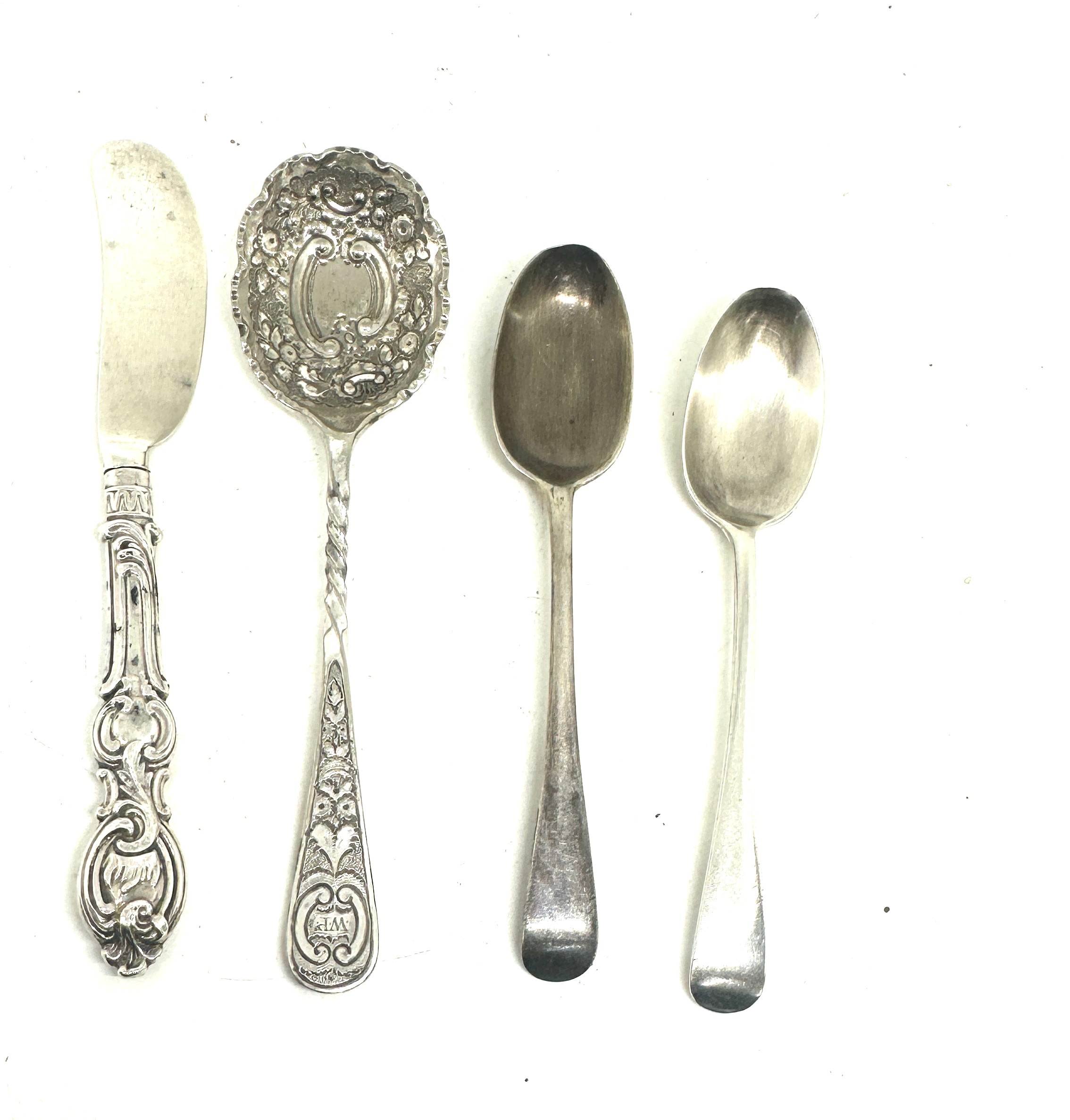 2 Silver spoons and a silver butter knife with 1 other, total silver weight 62 grams
