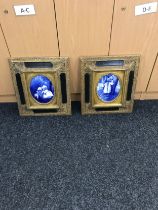 Pair of framed blue and white tiles, measures approximately 17 inches by 15 inches