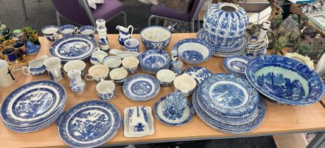 Large selection of blue and white pottery to include plates, vases etc