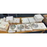 Selection of 23 boxed collectors plates includes Royal Doulton and Wedgwood