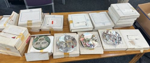 Selection of 23 boxed collectors plates includes Royal Doulton and Wedgwood