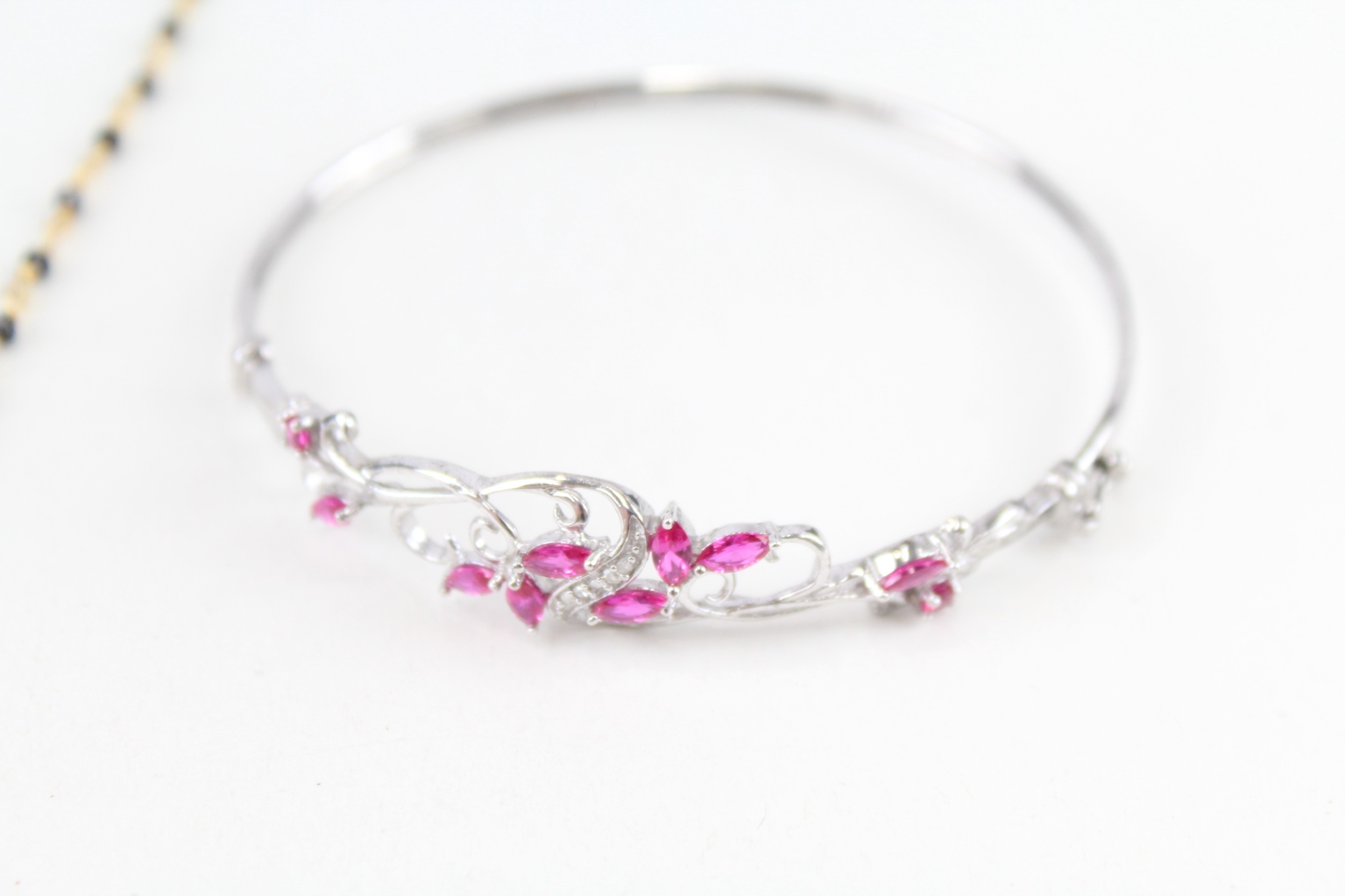 A silver necklace and bangle, set with diamonds, ruby and sapphire (16g) - Image 2 of 6