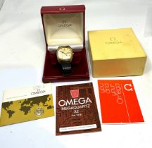 Boxed Omega megaquartz 32 cal1310 box and papers the watch is not ticking possibly needs new battery