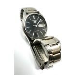 Vintage Seiko 5 Automatic Day & Date 7009 -3100 the watch is ticking black dial