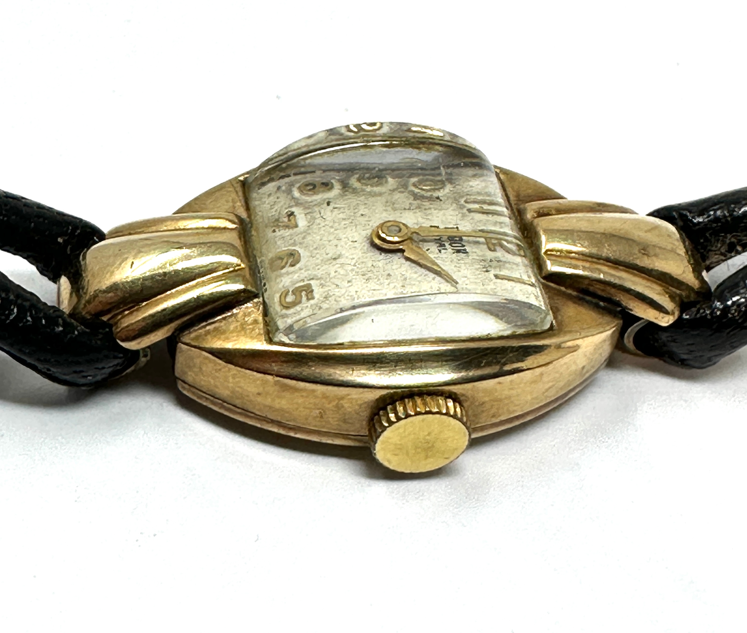 Vintage 9ct gold ladies rolex tudor wristwatch with black leather strap the watch winds and ticks - Image 2 of 4