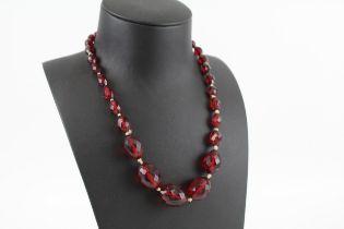 A cherry bakelite graduated prystal bead necklace (38g)