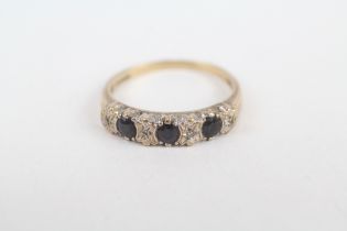 9ct gold sapphire three stone ring with diamond accent