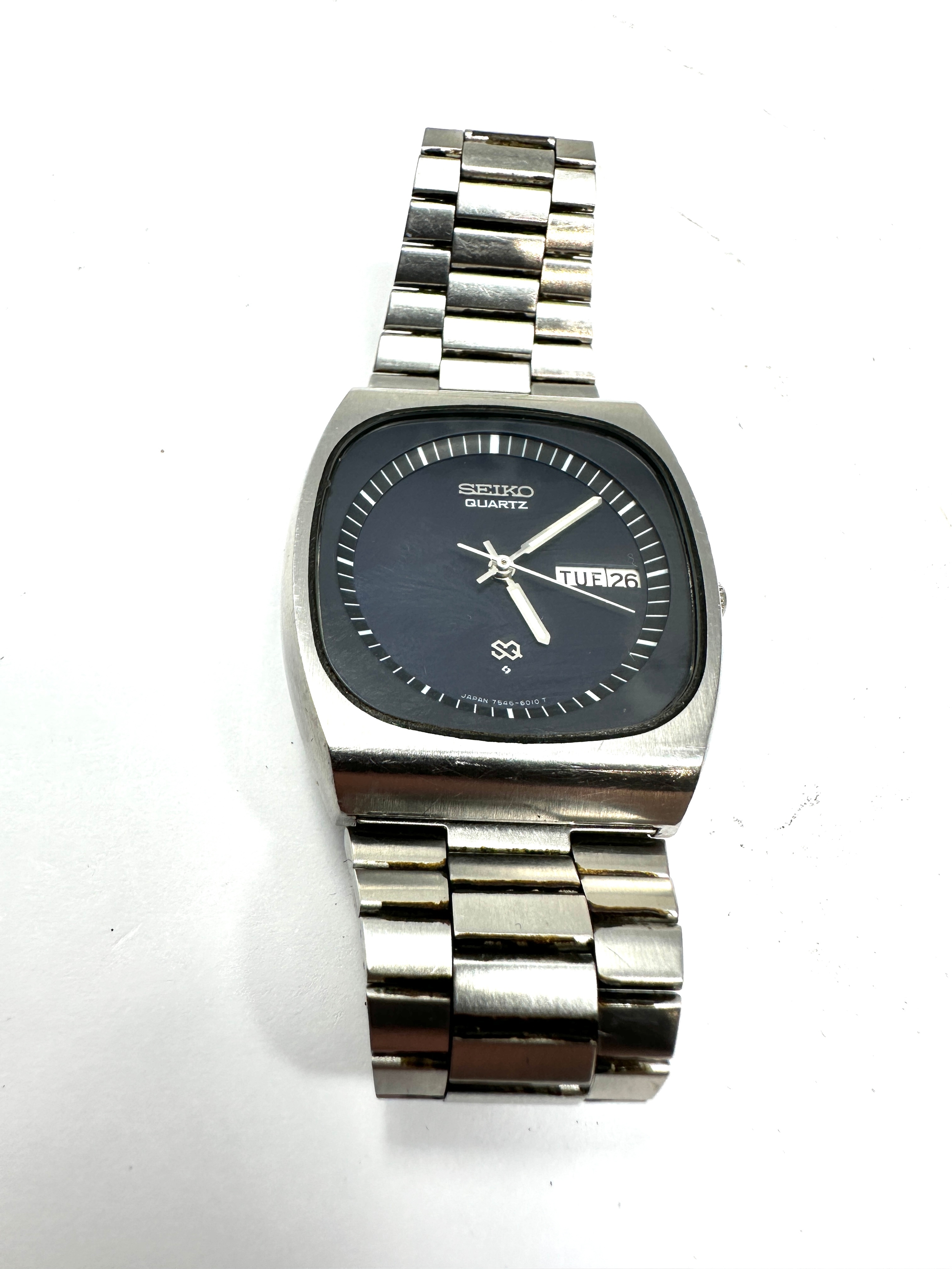 Gents quartz Seiko day date sq 7546-6010 the watch was ticking but has stopped possibly needs