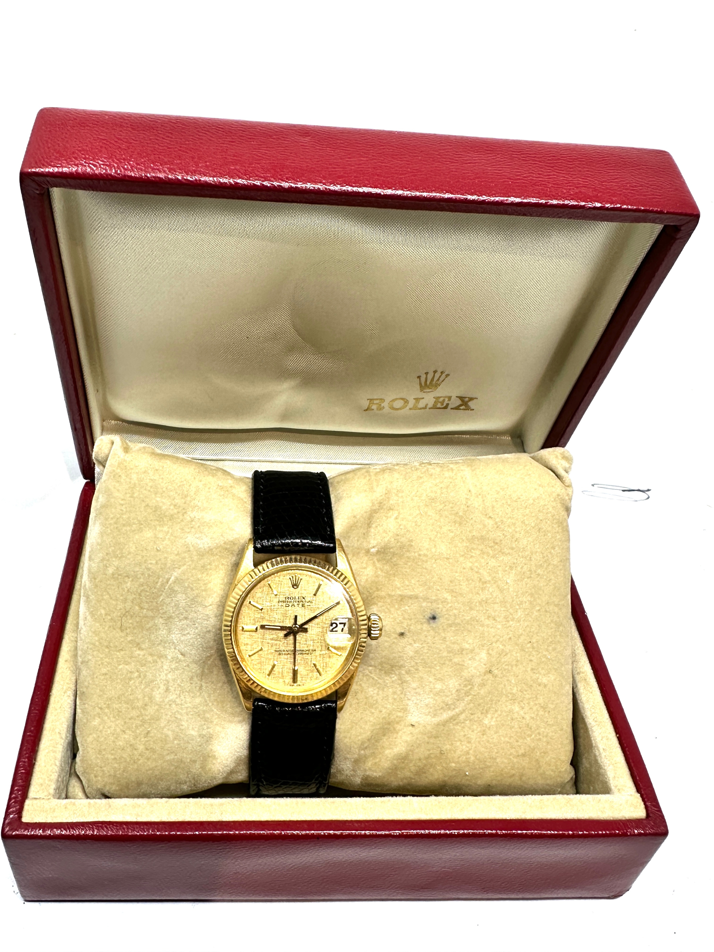 Boxed 18ct gold ladies rolex oyster perpetual date chronometer with black leather strap with 18ct