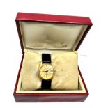 Boxed 18ct gold ladies rolex oyster perpetual date chronometer with black leather strap with 18ct