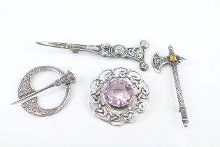 Four Scottish silver brooches including a penannular (46g)