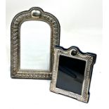 2 Silver picture frames largest measures approx 19.5cm by 13cm
