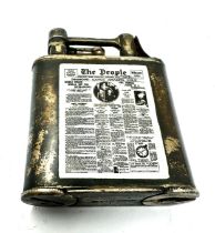 Silver lift arm cigarette lighter with the enamel the people news paper