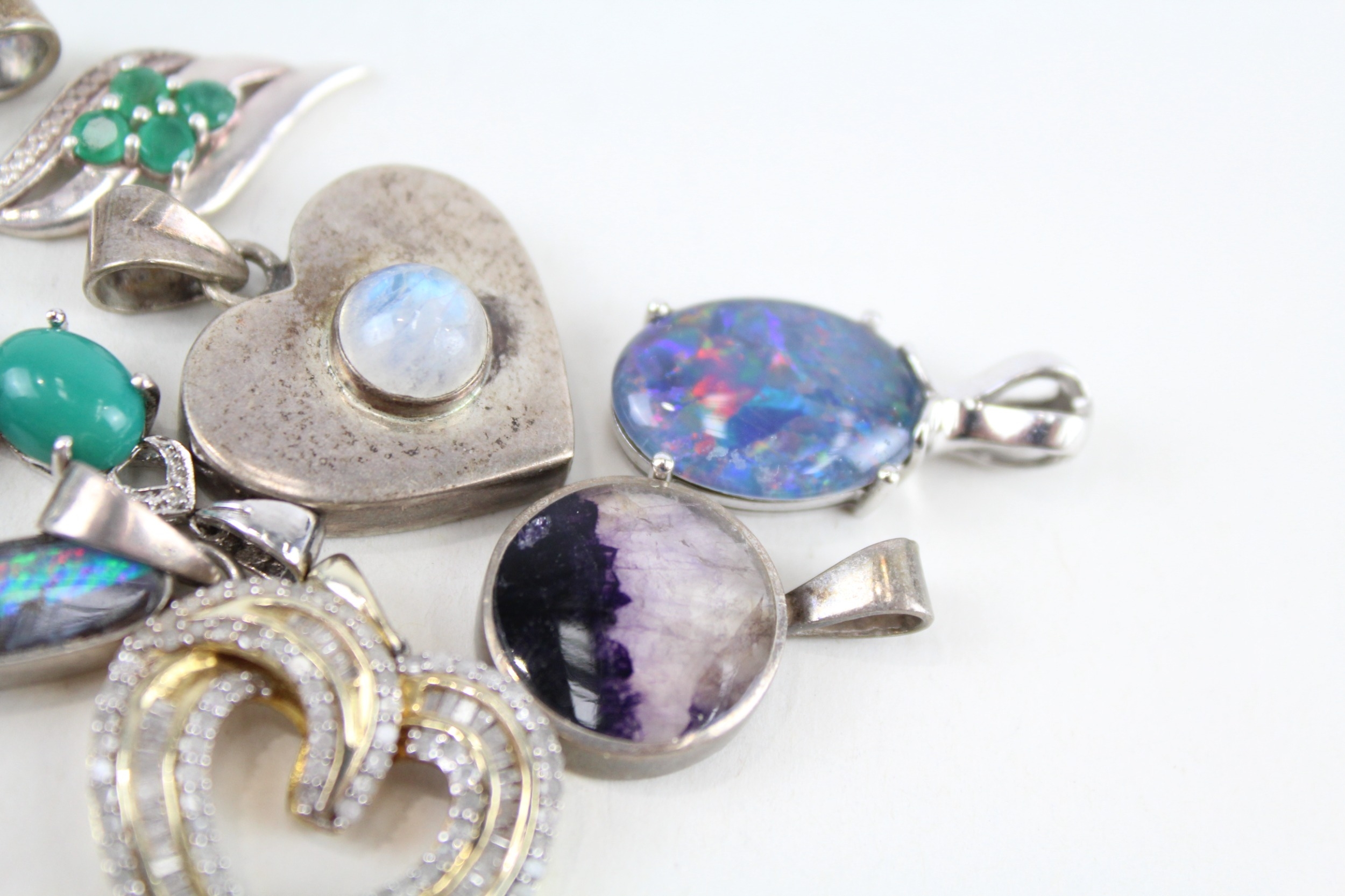 Twelve assorted silver stone set pendants including moonstone and opal (40g) - Image 6 of 6