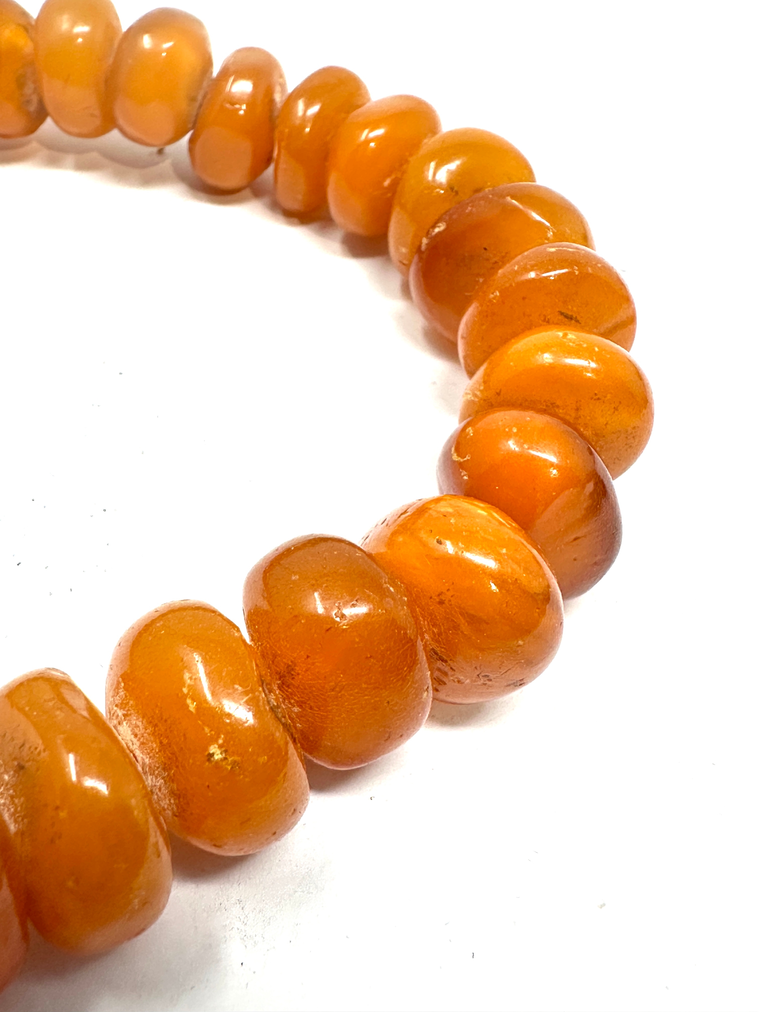 Egg yolk amber bead necklace weight 65g - Image 3 of 5