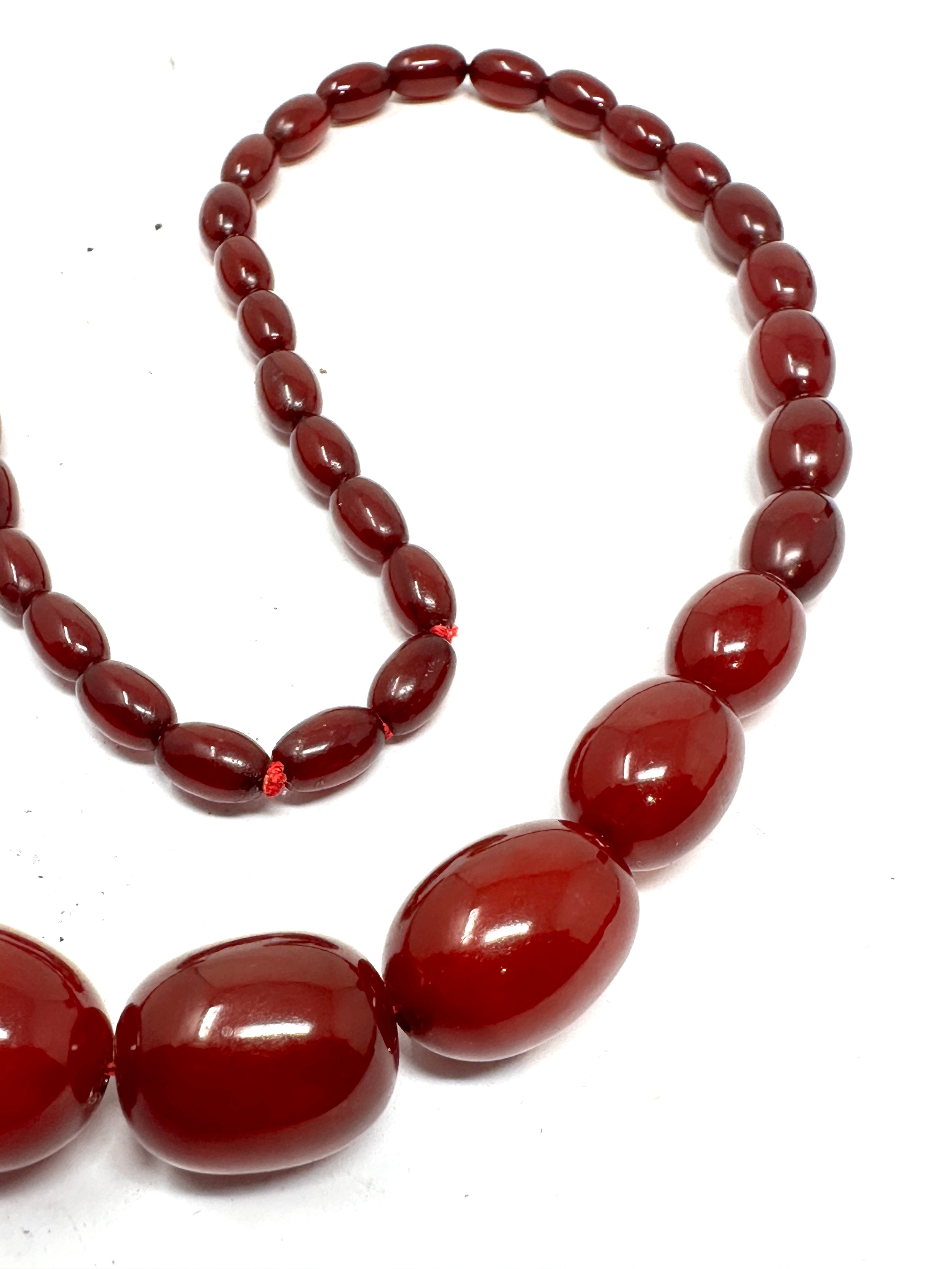 Antique cherry amber / bakelite bead necklace weight 63g good internal streaking - Image 3 of 3