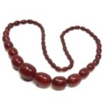 Antique cherry amber / bakelite bead necklace weight 63g good internal streaking