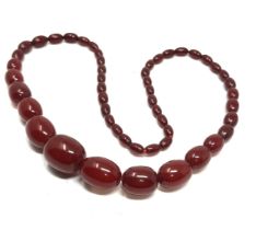 Antique cherry amber / bakelite bead necklace weight 63g good internal streaking
