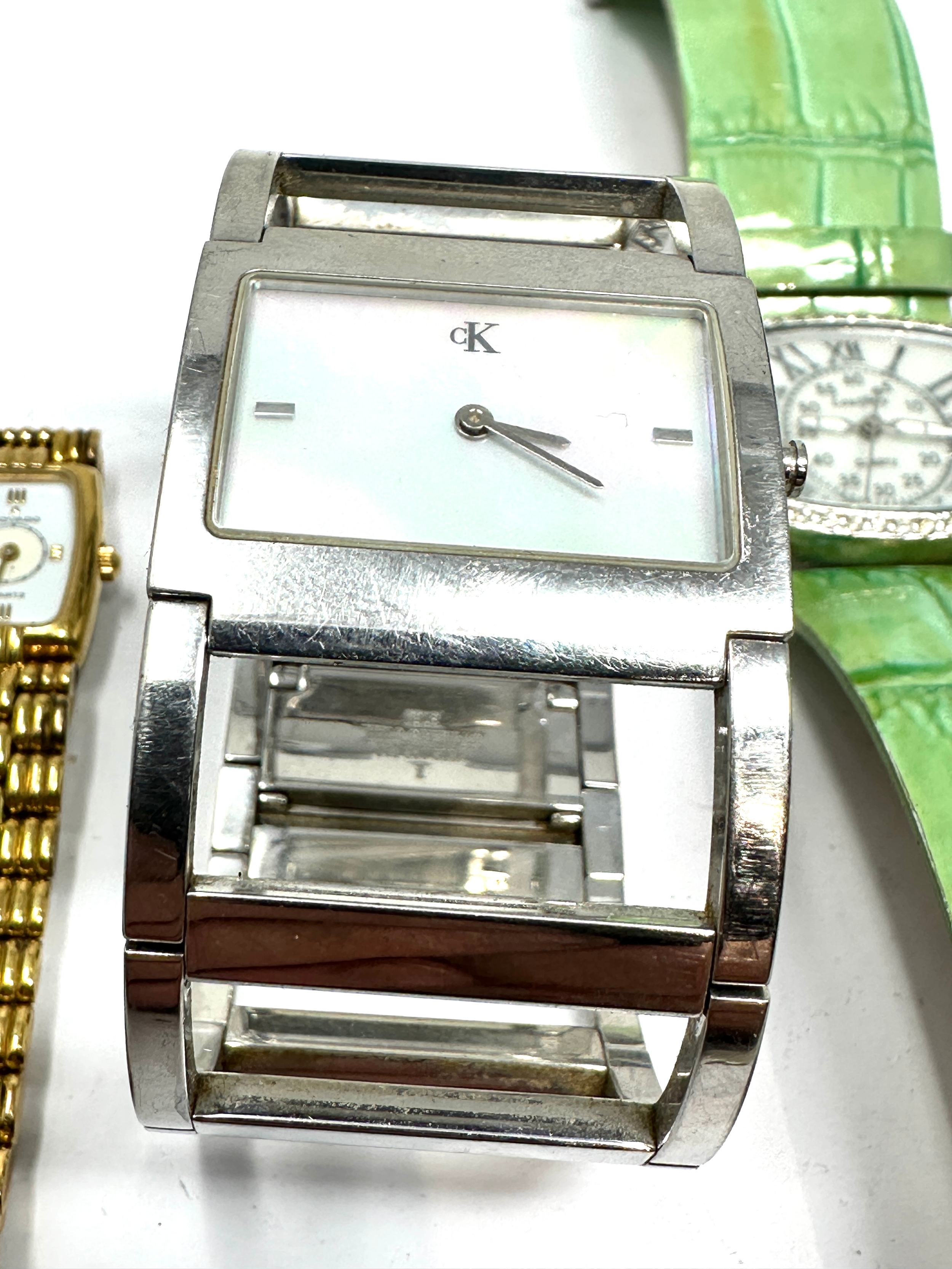 5 ladies wristwatches quartz includes calvin klein tag heuer dkny movado etc possibly need new - Image 3 of 4