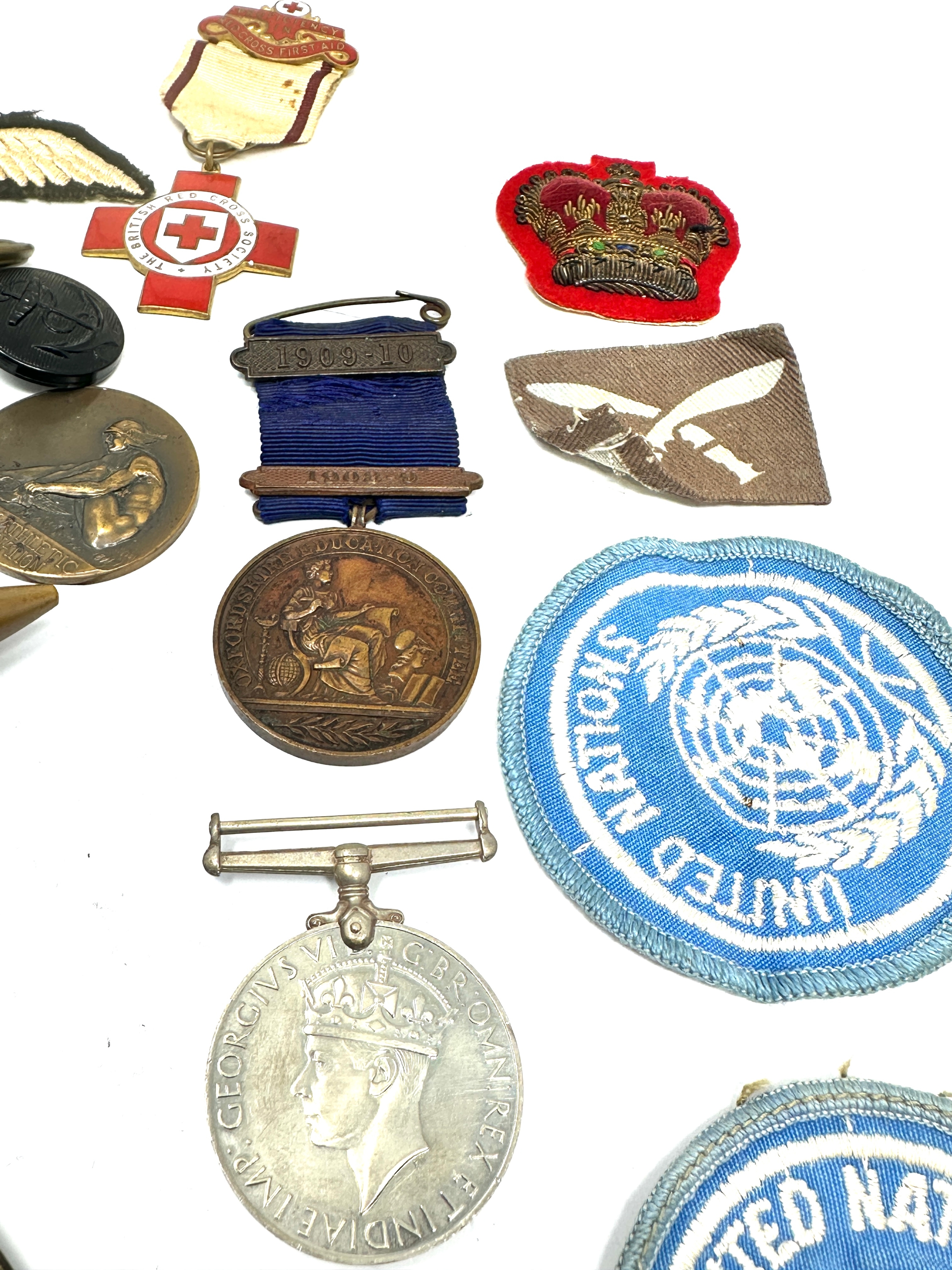 selection of military items inc bullet lighter cap badges buttons patches etc - Image 4 of 5