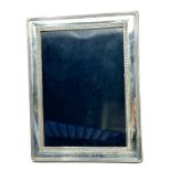 Vintage silver picture frame measures approx 22 cm by 17cm