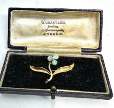 Boxed antique 15ct gold opal pendant / brooch measures approx 3.6cm wide 2.4cm drop weight 3.1g come
