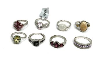 Selection of 8 silver gemstone set rings