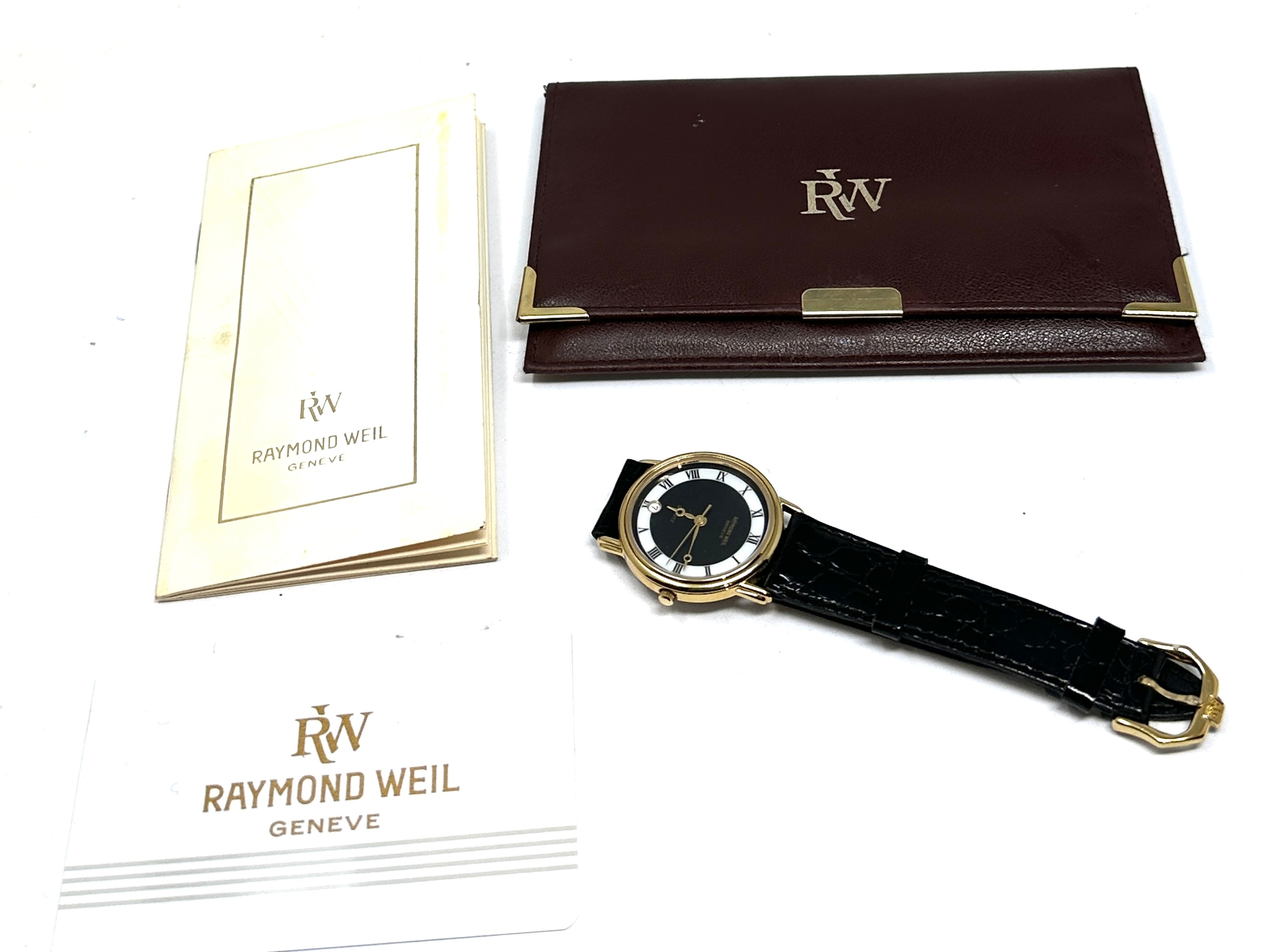 Gents raymond weil geneve wristwatch comes in wallet and booklet in working order