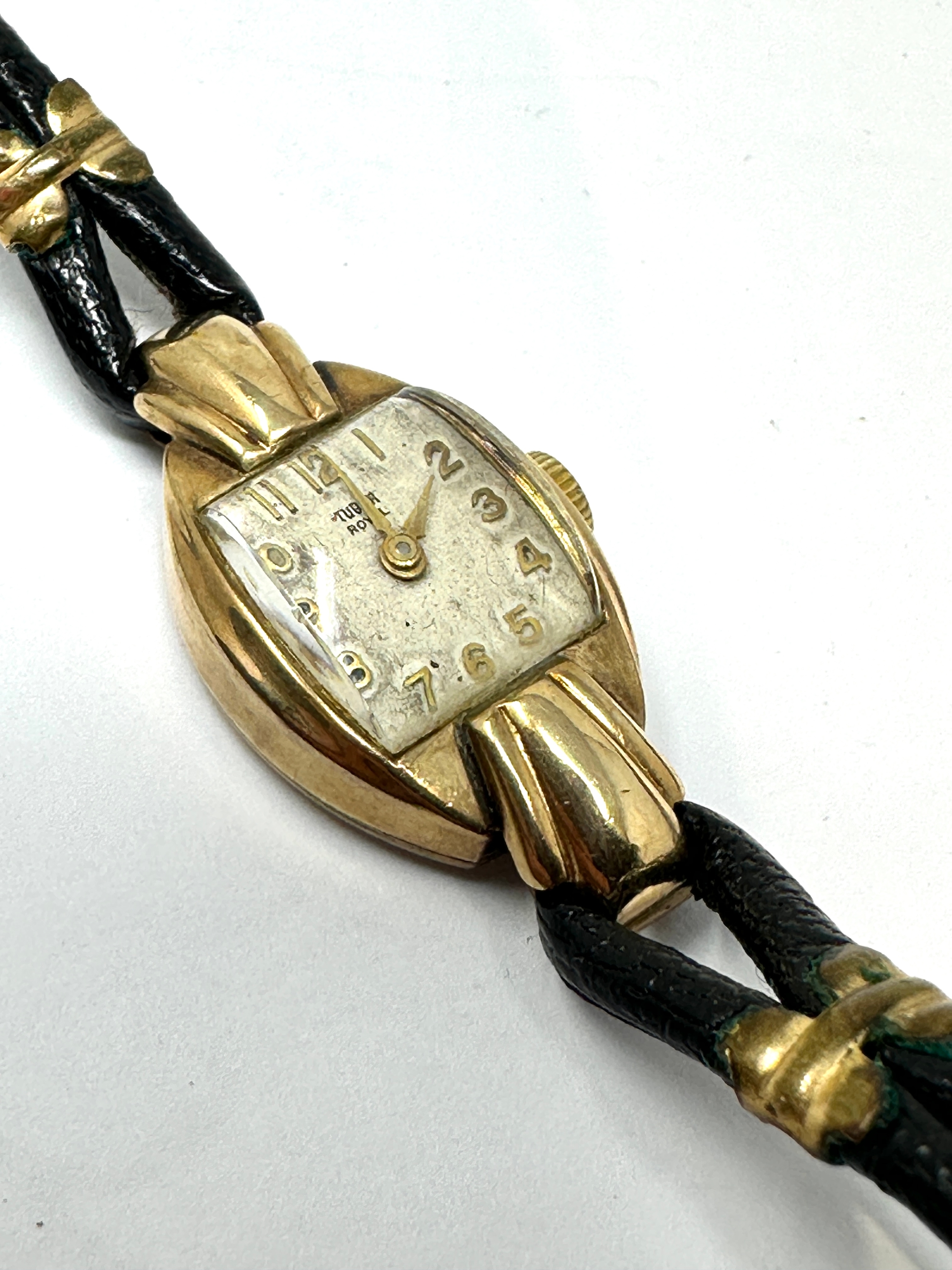 Vintage 9ct gold ladies rolex tudor wristwatch with black leather strap the watch winds and ticks