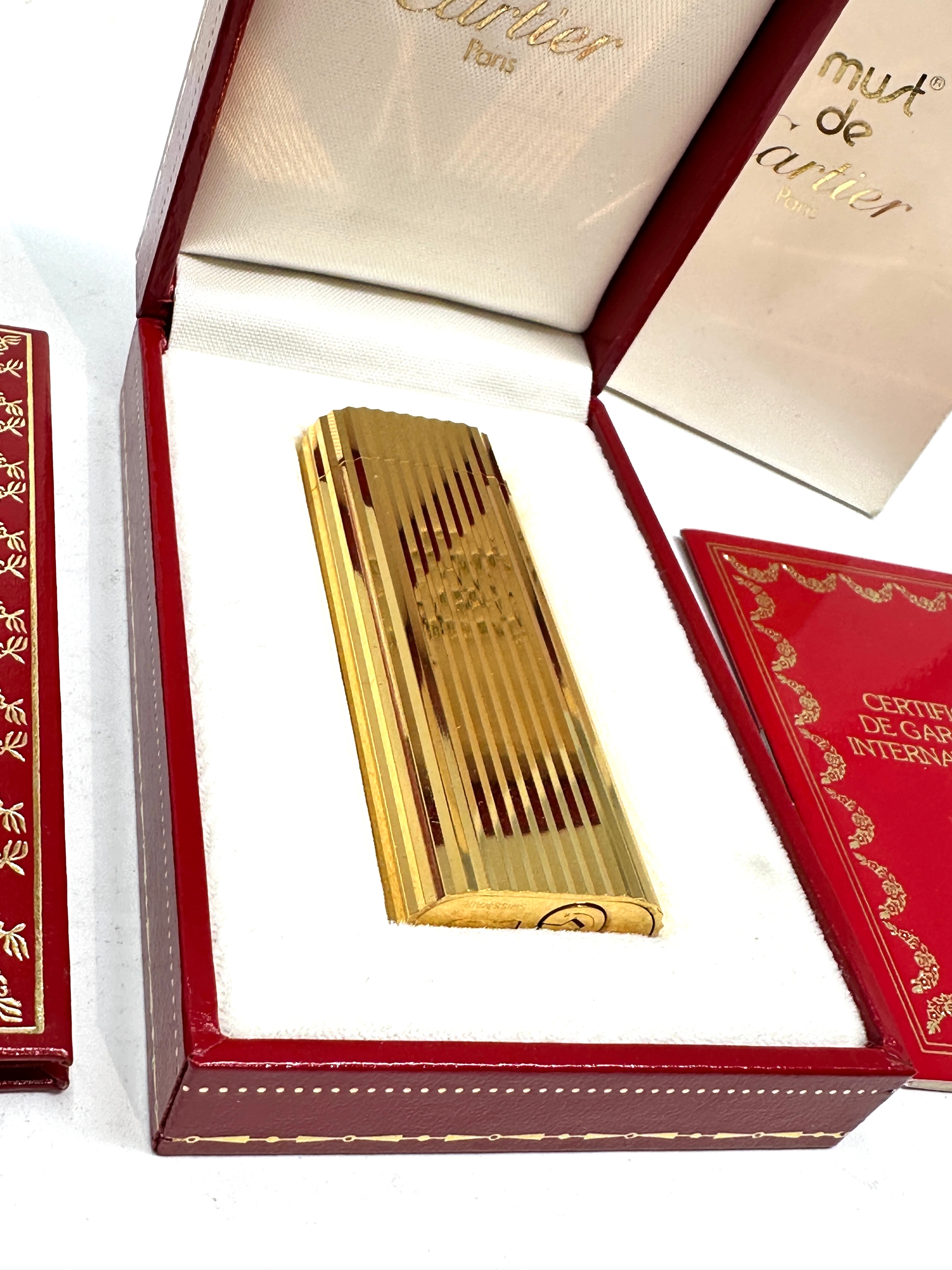 Original boxed Cartier cigarette lighter in as new condition complete with boxes and booklet - Image 2 of 4