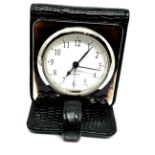 hallmarked 925 silver cased quartz travel alarm clock in black leather case the clock is ticking