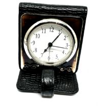 hallmarked 925 silver cased quartz travel alarm clock in black leather case the clock is ticking