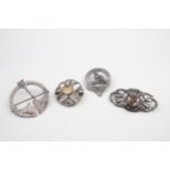 Four silver Scottish brooches including gemstone (41g)