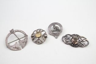 Four silver Scottish brooches including gemstone (41g)