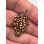 Antique rose cut diamond yellow metal brooch weight 7.3 gms length 4cm central diamond approx 4mm by