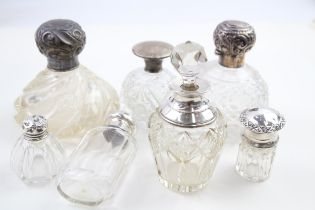 7 x .925 sterling banded / topped & cut glass ladies vanity scent bottles