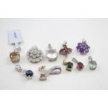 A collection of silver TGGC gemstone pendants including Opal (21g)